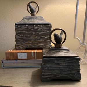 Two ceramic boxes w/bird and brass ring as handle.